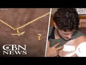 Read more about the article Gunman’s Shot Deflected by Cross – Miraculous Escape Revealed!